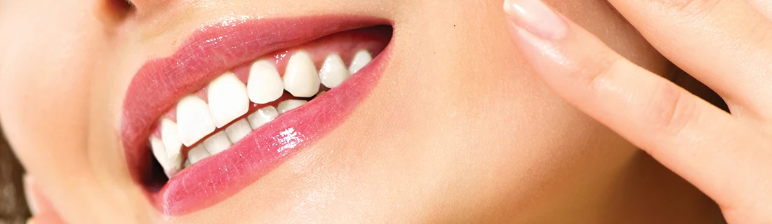 Dentist Tuscaloosa AL Expressive Woman Close Up photograph of an Expressive Woman close up smiling big grinning ear to ear